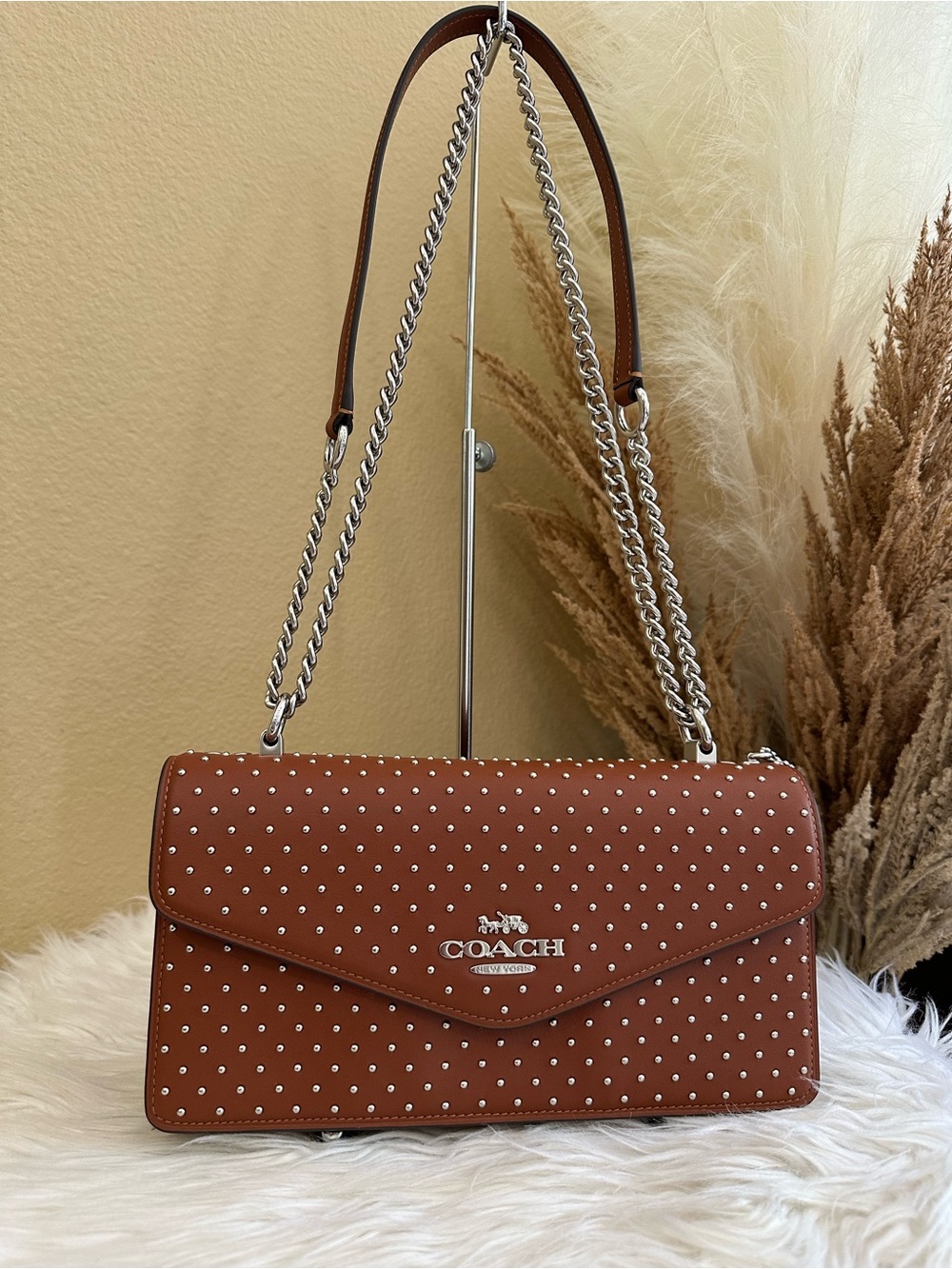 Coach Klare Envelope Crossbody Bag
With Rivets